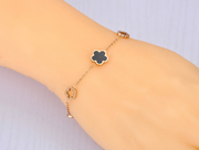 Bracelet with flower and other pendants