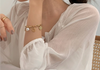 Bracelet pendentif avec perles en or